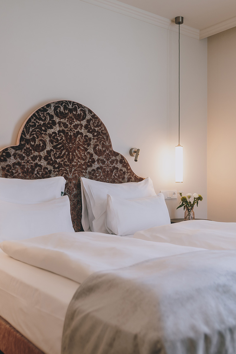 Gemütliches Bett im Superior Zimmer des Wellnesshotels Bad Ischl