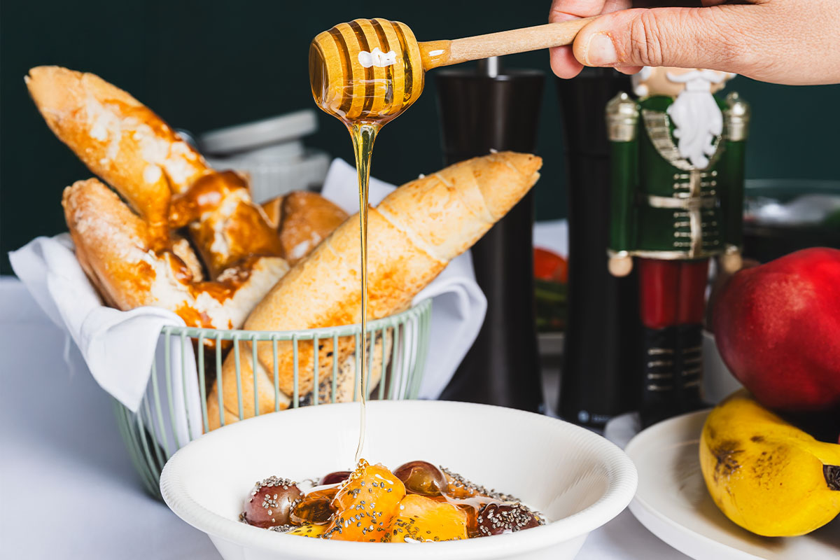 Bread and fruit at Wellnesshotel Bad Ischl with honey drizzle